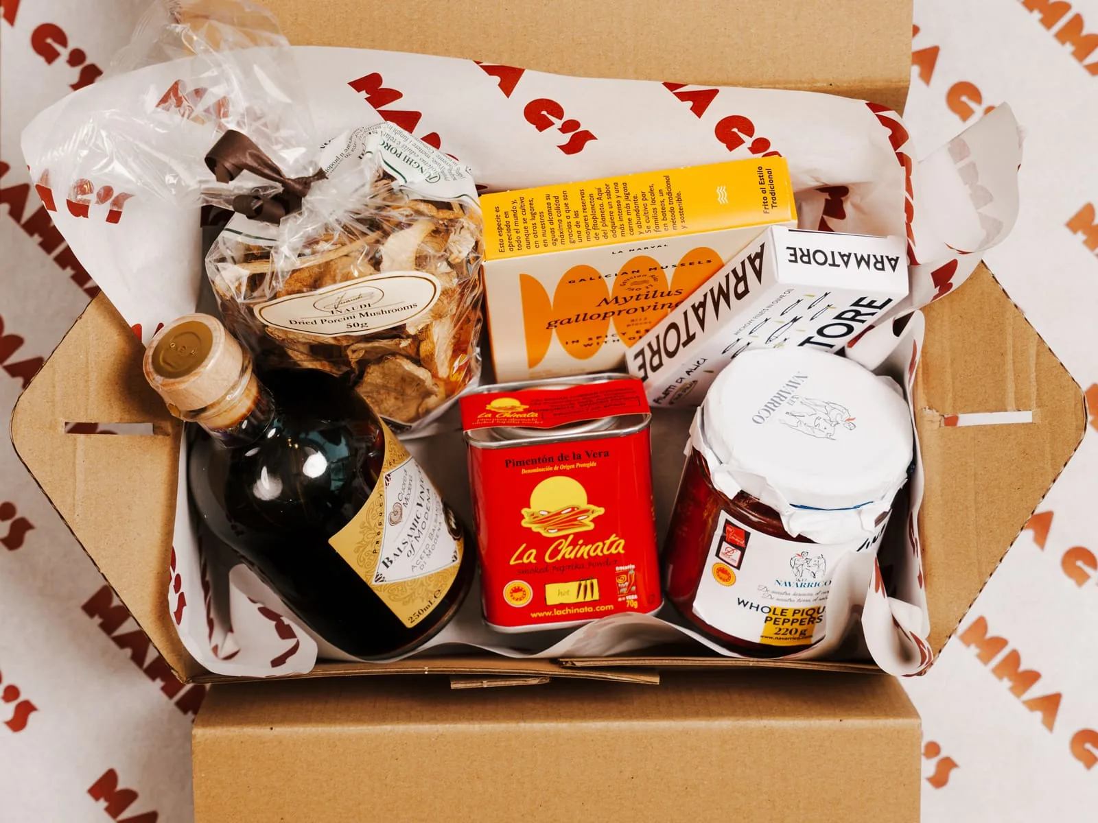 A Mamma G's hamper box packed with pantry goods, wine and preserves